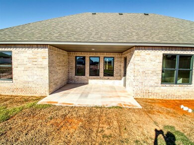 Entrance to property with a patio