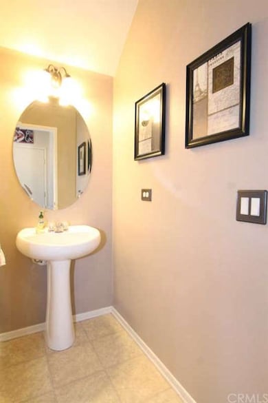 The half bath is downstairs.