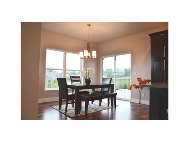 Eat-in Kitchen. Sliding doors to the outside deck.