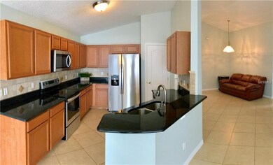 Kitchen with breakfast bar.