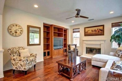 Family room w/ beautiful hardwood floor