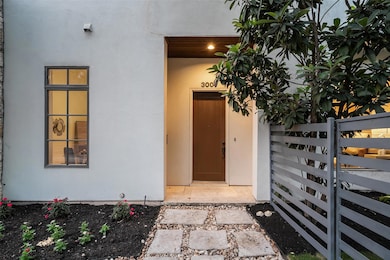 Property entrance with stucco siding