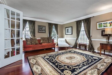 Spacious Living Room with Gleaming Hardwood, Frenc