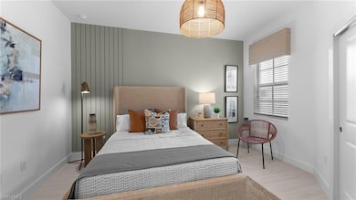 Bedroom featuring baseboards