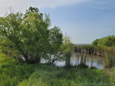 Pond is in front of home making for a beautiful vi