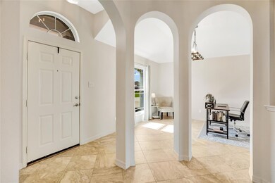 Elegant front entrance adorned with tiled flooring