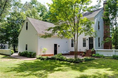 Alternate view of patio, with raised garden beds s