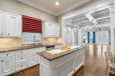 This photo showcases a bright, open-concept kitche