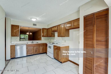 7676 Melissa Ct N, Jacksonville, FL 32210 - photo 4