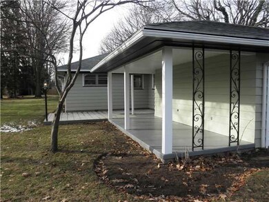 Exterior Back Covered concrete patio and paver pat