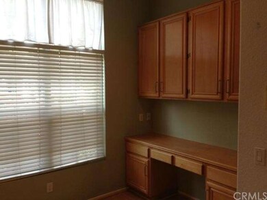 Eating area in kitchen with built-in desk