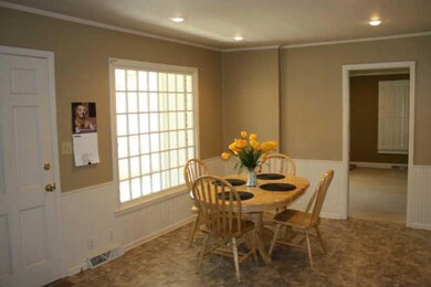 Eat in area of the kitchen w/ recessed lighting.