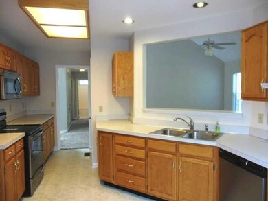 EAT-IN KITCHEN WITH NEW STAINLESS STEEL RANGE, DISHWASHER AND MICROWAVE PLUS PANTRY!