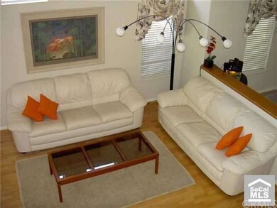 Formal Living Room with Vaulted Ceilings & Hardwoo