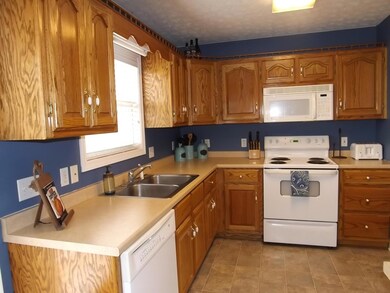 Spacious kitchen with lots of cabinets & counter-space!
