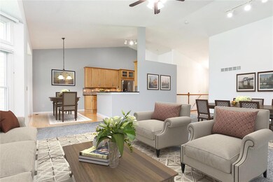 Virtually staged photo of the living room space wi