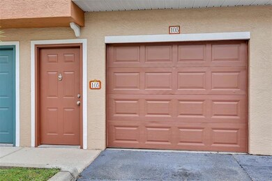 UNIT 105/EXTERIOR FRONT/GARAGE
