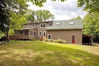The rear of the home, freshly...