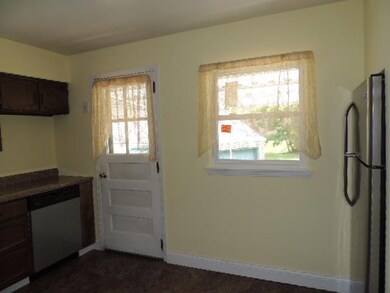 Kitchen. Kitchen door opens to side porch, great f
