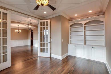 Office/Library with French Doors, Built-ins. Notice the coffer details on the Ceiling.