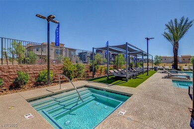 Community pool featuring a community hot tub and a