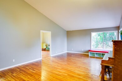 Bright front room with hardwood floors