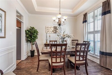 Spacious dining room with custom wainscoting/ moul