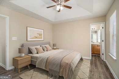 Upstairs, the Primary Suite includes a Walk-In Closet and a Private Ensuite Bathroom