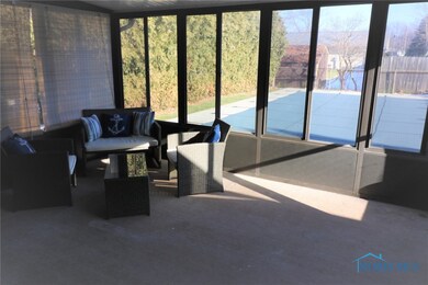 SUNROOM OVERLOOKING POOL