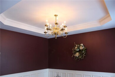 The elegant try ceiling adds a beautiful touch to 