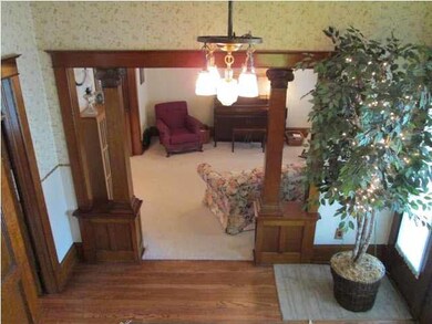 View from stairway looking into front parlor.