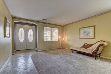 Entrance foyer, formal living room with lots of li