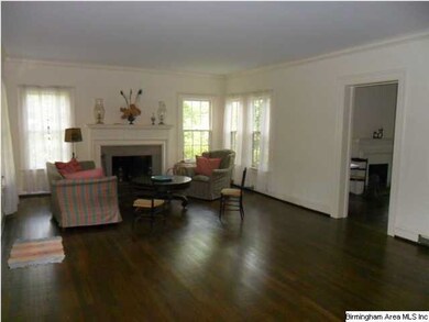 formal living room with refinished hardwood floors