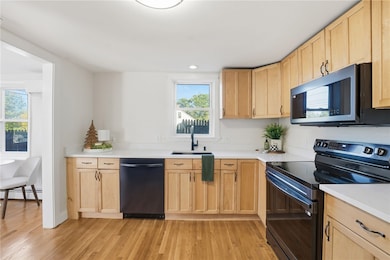 Updated kitchen with brand new black stainless appliances