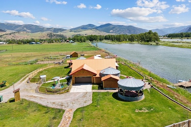 Drone / aerial view with a rural view and a water and mountain view