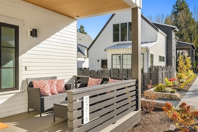 Enter your new home through the sun drenched west facing covered front porch.