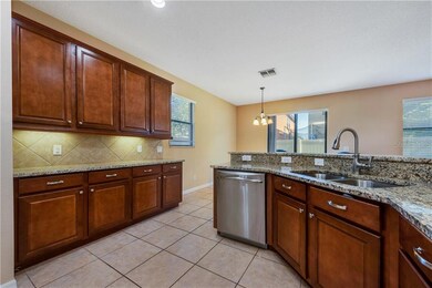 KITCHEN offers plenty of cabinet space and is open