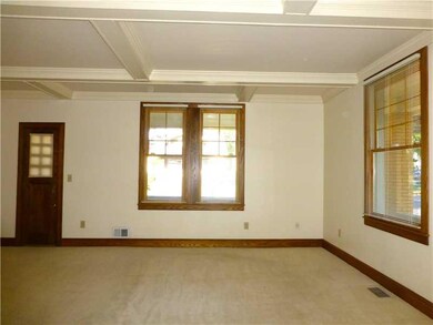 Living Room. living room with beamed ceiling
