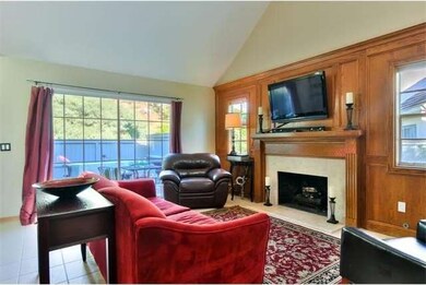 Large living room with fireplace, bar and dramatic