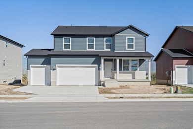 **DISCLAIMER, exterior and interior option may vary**Traditional-style house with covered porch, concrete driveway, and an attached garage