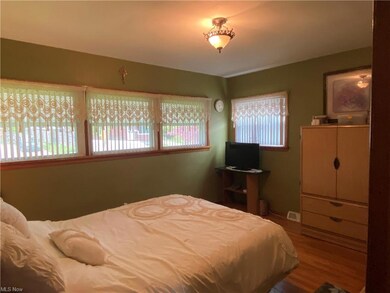 Master bedroom boasts loads of natural light and o