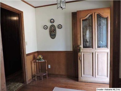 Foyer has hardwood floors.