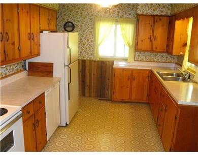 Kitchen. Cheerful country kitchen with handmade ca