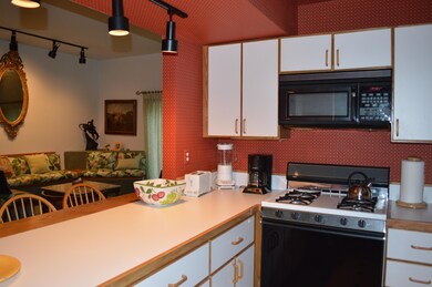 kitchen w pass-through to great room