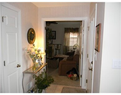 Entry/Foyer. Ceramic tile entry with access to den