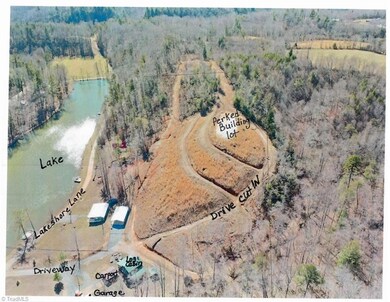 Labeled view, building lot sits above lake (higher elevation)