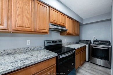 Unit A -- granite countertops, stainless appliance