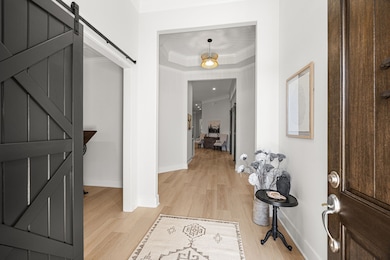 A great entry with an office just to the left