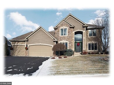 This picturesque 2-story walkout home sits on a qu