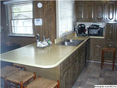 BREAKFAST BAR IN UPDATED KITCHEN
